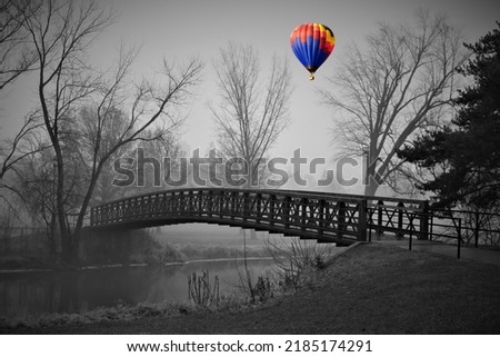Black and White Photo Foot Bridge Over Fox River Color Hot Air Balloon