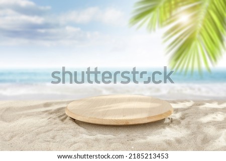 Wooden pedestal of free space for your decoration and summer landscape of beach.  Royalty-Free Stock Photo #2185213453