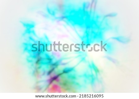 Abstract blurred image with bright blue colour from defocused multiple exposed photo for use as background or backdrop 
