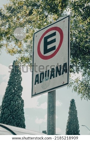 Sign written 'Aduana' in the Spanish language of Uruguay. Translating into English Customs