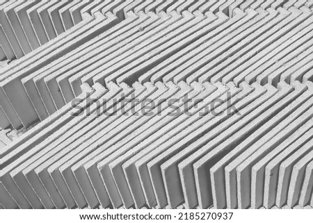 White grey background of roof tile pile in construction site