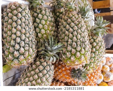 A lot of pineapple fruit background. At the traditional market