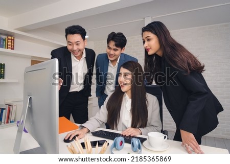 Business Asian people in formal outfit working together and brainstorming in modern office workplace.