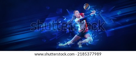 Creative artwork with female volleyball player in motion with ball isolated on dark blue background with neoned elements. Concept of art, creativity, sport, energy and power. Horizontal banner, flyer Royalty-Free Stock Photo #2185377989