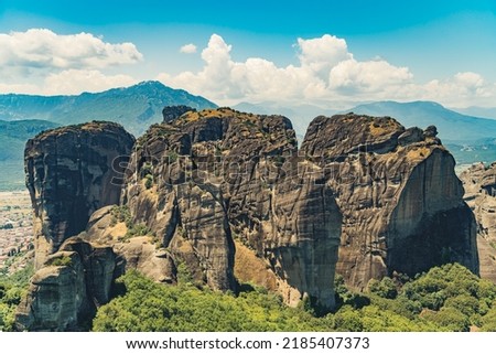 Stiff natural big rock formation Sandstones of Meteora nearby the city of Kalambaka. Beautiful summer weather. Leisure time traveling. High quality photo