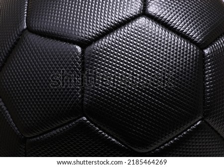 Black soccer ball texture background.