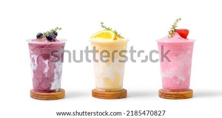 Strawberry, blueberry and orange yogurt smoothie with Strawberry blueberry and orange fruit, isolated on white background. coffee shop cafe menu concept. Royalty-Free Stock Photo #2185470827
