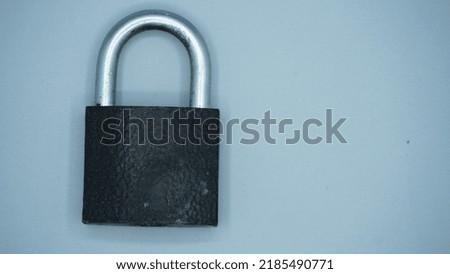 Locked black Padlock on the white background.