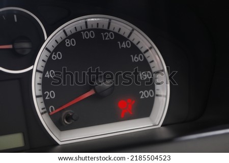 Closeup view of dashboard with warning icon check airbag system in car Royalty-Free Stock Photo #2185504523