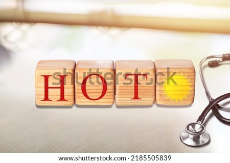 The inscription concept with wooden blocks next to a medical stethoscope, Concept, Health risk due to overheating of the body, summer heat and Climate warming
