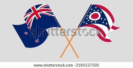 Crossed and waving flags of New Zealand and the State of Ohio. Vector illustration
