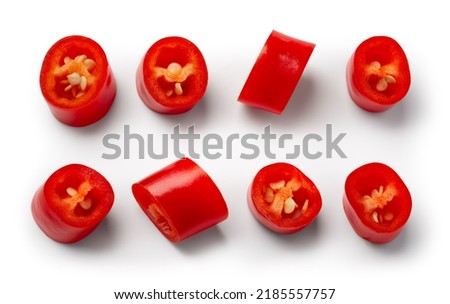 Chili pepper isolated. Cut chilli top view on white background. Red hot chili peppers slice top. With clipping path. Royalty-Free Stock Photo #2185557757