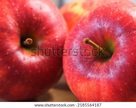 Delicious red apples photographed in macro. Ripe fruit.