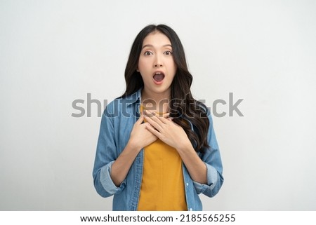 Young beauty asian woman shouting, amaze with shock deal, isolated on gray background