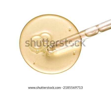 Cosmetic serum gel beauty drop and cosmetic pipette on white background. Skincare beauty product with bubbles texture.	 Royalty-Free Stock Photo #2185569713