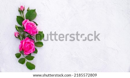 Festive flower composition on a light background. Overhead view. copy space