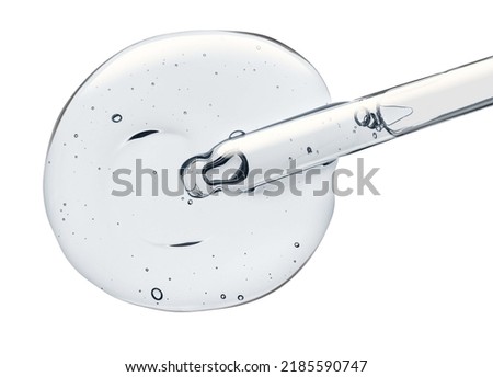 Liquid gel or serum gray transparent on a screen of microscope white isolated background Royalty-Free Stock Photo #2185590747