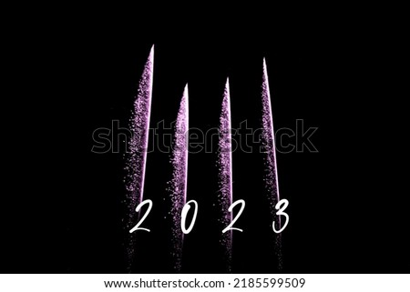 Happy new year 2023 pink fireworks rockets new years eve. Luxury firework event sky show turn of the year celebration. Holidays season party time. Premium entertainment nightlife background