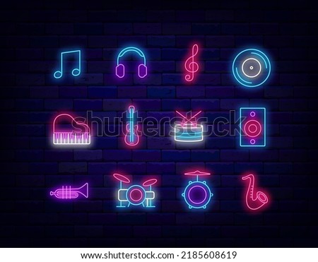 Music neon icons collection. Notes, headphones and musical instruments. Drum kit. Music store emblem. Night club badge. Light signboards set. Outer glowing effect signs. Vector illustration