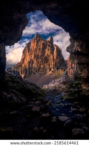 View of high mountain from the cave. Mountain cave view