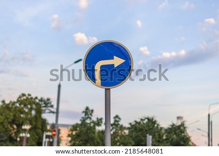 road sign for turning right only side view