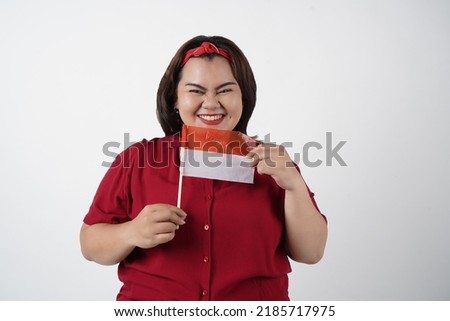 Portrait of indonesia young asian  woman with indonesian flag, Indonesian Independence day concept