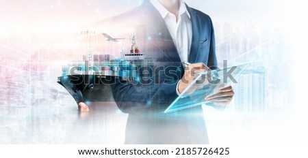 Business and Technology Digital Future of Cargo Containers Logistics Transport Concept, Double Exposure of Business man using Tablet and Freight Ship at Port, Transportation Import Export Background Royalty-Free Stock Photo #2185726425