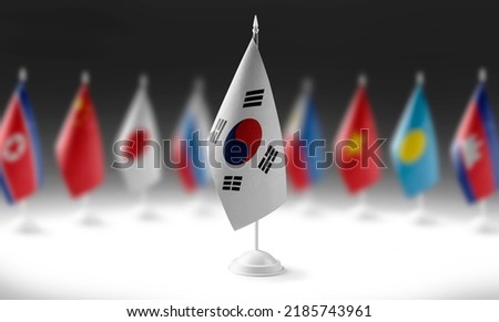 The national flag of the South Korean on the background of flags of other countries