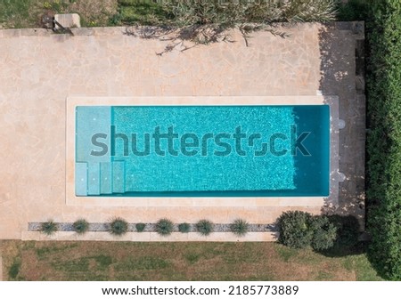 Aerial view of swimming pool in a country estate