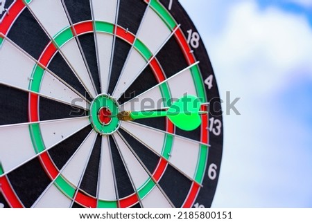 circle target for shooting on dart board aiming, to succes comes after a lot of tries.