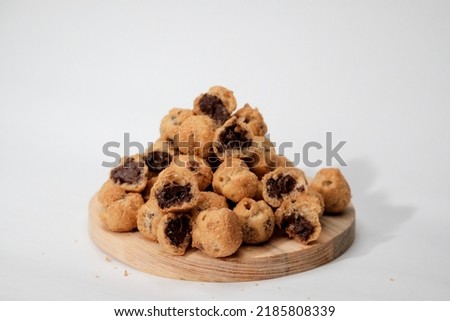 Indonesian Snack Mini Chocolate Soes Served on The Wooden Board Royalty-Free Stock Photo #2185808339