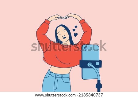Illustrations of Beautiful Young woman influencer created her dancing video by smartphone camera Royalty-Free Stock Photo #2185840737