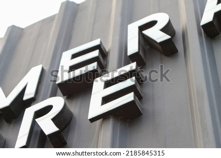 Chrome letter sign for company brand. Hang over aluminium font using for signage