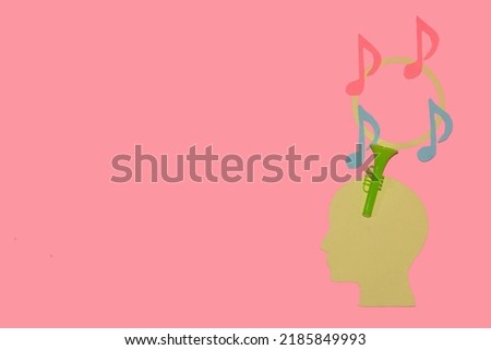 paper head with trumpet leading to circle on musical notes, copy space, creative art modern design