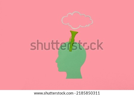 paper head with trumpet leading clouds as copy space, creative art design