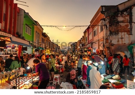 Phuket Walking Street night market in Phuket old town, Thailand. Royalty-Free Stock Photo #2185859817