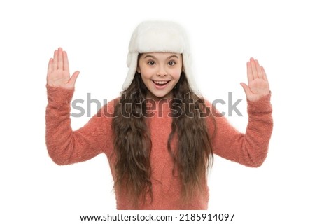 fur earflap hat fashion. happy little girl loves winter. finally winter holidays. enjoy christmas vacation. good mood in any weather. warm apparel for cold weather. childhood happiness and joy