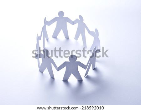 close up of  paper people on white background