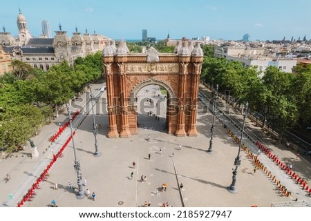 Aerial view of Barcelona Urban Skyline and The Arc de Triomf or Arco de Triunfo in spanish, a triumphal arch in the city of Barcelona. Sunny day. Royalty-Free Stock Photo #2185927947