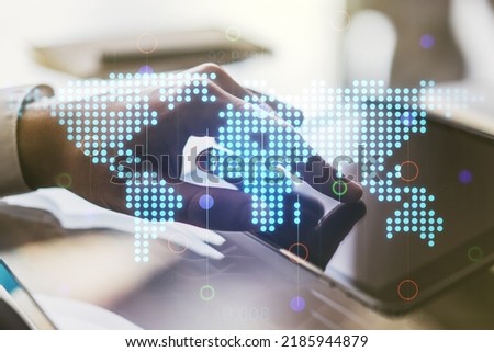 Double exposure of abstract digital world map and finger clicks on a digital tablet on background, research and strategy concept