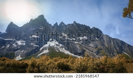 The Troll Wall (English) or Trollveggen (Norwegian),a part of the mountain massif Trolltindene,  in the Romsdalen valley in Rauma Municipality in Møre og Romsdal county, Norway.  Royalty-Free Stock Photo #2185968547