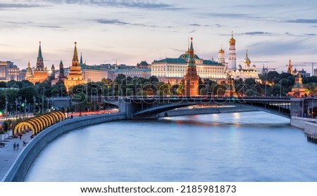 Moscow Kremlin at Moskva River, Russia. Scenery of Moscow city center at sunset. Beautiful Moscow cityscape at blue dusk, nice landscape, skyline of Russian capital. Travel and tourism in Russia theme