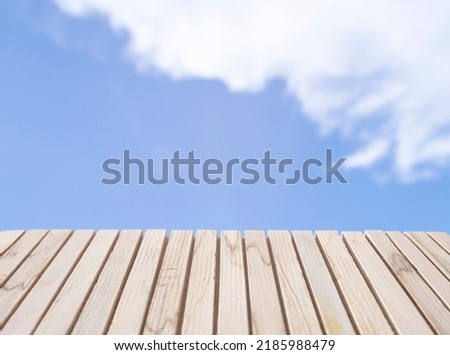 empty outdoor terrace wooden floor and a clear natural sky area