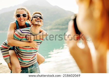 Woman taking picture at friends
