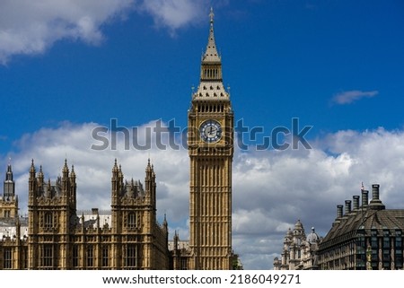 Detail view of the British Parliament and the Big Ben under cloudy blue sky