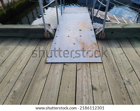 A metal plank extending off a dock area in Lunenburg NS.