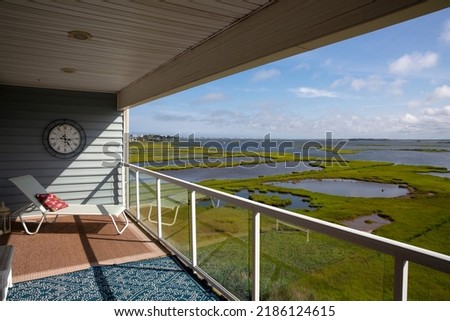 Overlooking Ocean City, Maryland and the wetlands from a vacation house balcony at Fenwick Island, Delaware, USA Royalty-Free Stock Photo #2186124615