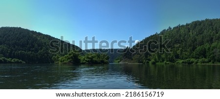 Geography, potamology. Middle Siberia (south part). Panorama of powerful rivers and taiga forests, summer, Typical coniform hill oreography (bald peak). - absence of people and virginal natural area Royalty-Free Stock Photo #2186156719