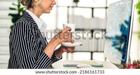 Professional businesswoman work analysis strategy with startup project.business plan with technology desktop computer data network futuristic virtual screen in office.Teamwork concept