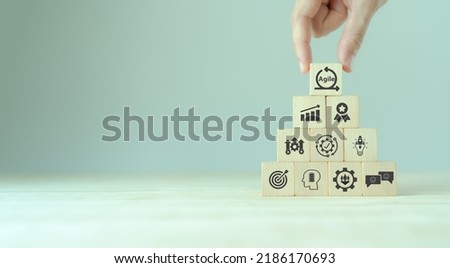 Agile management, the principles of agile software development and lean management to various management processes, product development lifecycle  and project management. Change driven concept. Royalty-Free Stock Photo #2186170693